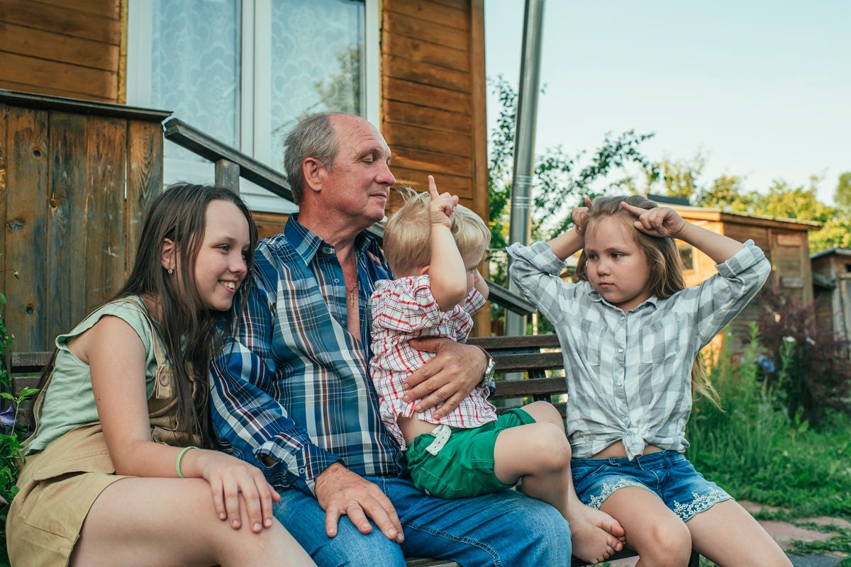 Grandparent spending quality time with kids outside