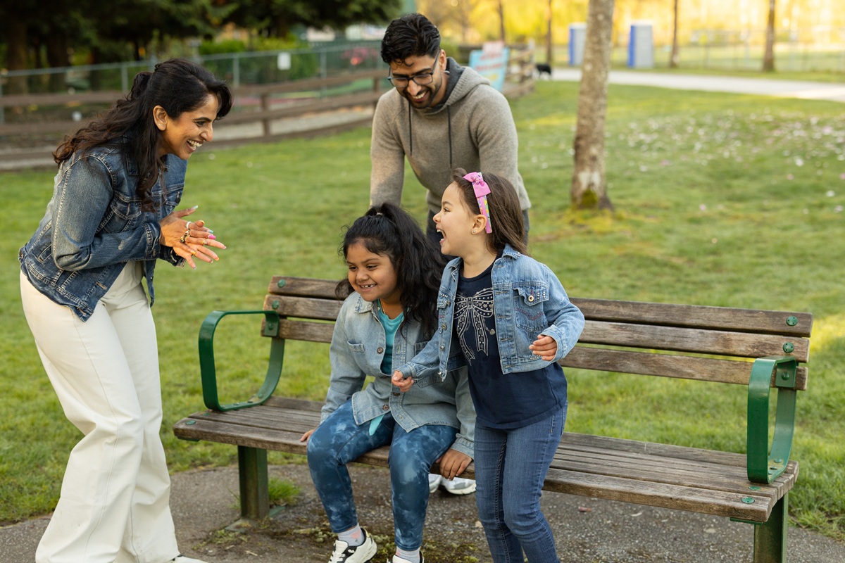 Family enjoying time together at a park on a beautiful sunny day